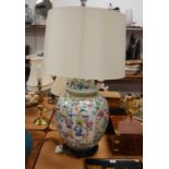 A large 20th Century Chinese famille rose jar and cover, converted into a table lamp, of globular