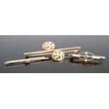A 9ct gold amethyst and seed pearl set bar brooch early 20th century ,1.3g; one other 9ct gold