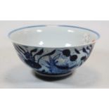 A Chinese export blue and white bowl, decorated with fish and water plants against a background of