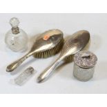Two silver backed hairbrushes; together with an Edwardian scent bottle with silver collar; and two