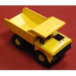 A Tonka yellow painted metal toy truck