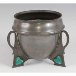 An Art Nouveau pewter jardinière, possibly by Archibald Knox and retailed by Connells of 83