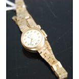 A ladies Rotary 9ct gold cased mechanical wrist watch with 9ct bracelet, gross weight 13.1g