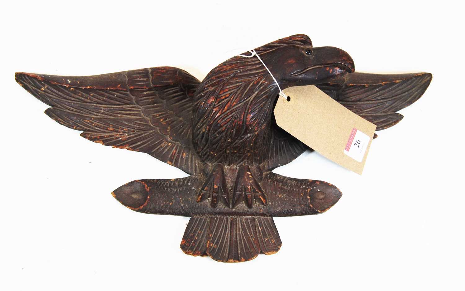 A 19th century carved oak model of an eagle, with glass eye, width 46cm