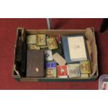 A large collection of assorted cigarette cards, contained in various tins, boxes and albums, to