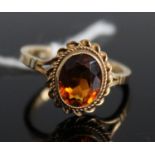 A 9ct gold orange citrine set dress ring, 2.5g, size L/M