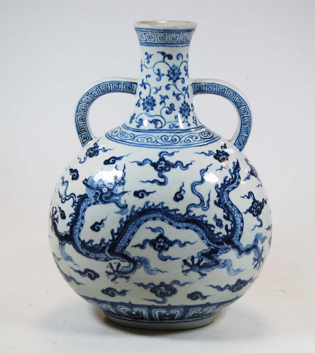 A Chinese export blue & white vase, with twin handles to the neck, decorated with a five clawed