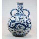 A Chinese export blue & white vase, with twin handles to the neck, decorated with a five clawed