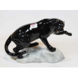 A Beswick Puma naturalistically modelled upon a rock, gloss finish, printed back stamp numbered