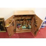 A 20th century plywood tool chest containing mixed tools