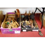 Two boxes of mixed 20th century tribal carvings, beads, etc