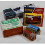 A box of mixed toys including Dinky Toys forklift, Dinky Toys convoy fire rescue truck, Corgi