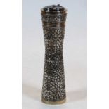 An Eastern white metal and embossed spice tower, chased with scroll leaves and foliage, stamped