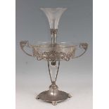 An Art Nouveau pewter and clear glass centrepiece by Orivit, having trumpet form centre over inset