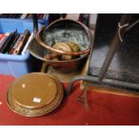 A collection of metalware to include a copper warming pan, copper coal scuttle and a copper fire