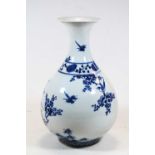 A Chinese export stoneware blue & white vase of baluster form with flared rim, decorated with