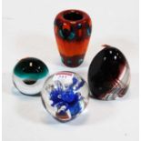 Three various modern glass paperweights; together with a Poole Pottery vase, h.10cmCondition report: