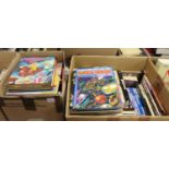 Four boxes of mixed books mainly being annuals to include Judge Dredd 2000AD etc