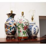 A 20th century Chinese Meiping shaped vase, converted into a table lamp, decorated with flowers,