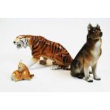 A Royal Dux porcelain German Shepherd, having pink triangle mark verso, h.20cm; together with a