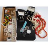 Assorted costume jewellery to include fashion watches, various neck chains, carved shell cameo