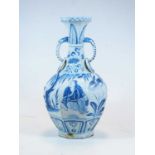 A Chinese export blue & white vase of octagonal baluster form, the neck flanked by twin ring
