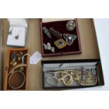 Assorted costume jewellery to include cuff links, brooches, childs silver bangle etc