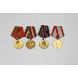A collection of four various Soviet Union commemorative medals