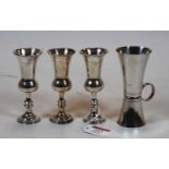 A set of three George V silver miniature goblets / communion measures, Chester 1913/14, h.10cm;