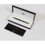 A Mont Blanc Meisterstruck fountain pen, having black cap and barrel with white metal banding and