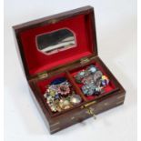 An Indian hardwood and brass mounted jewellery box, contents to include various paste set