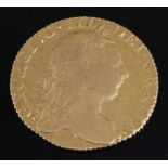 Great Britain, 1772 gold guinea, George III laureate bust, rev; crowned quartered shield, date