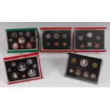 The Royal Mint, a collection of five proof sets to include 1987 Bank of Mauritius, 1988 Suriname,