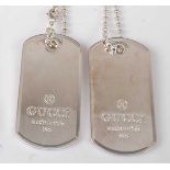 A pair of Gucci silver dog tags on single beaded chain, 44g, each 5cm