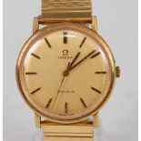 A gent's Omega Geneve gilt metal cased wristwatch, circa 1971, having a signed champagne dial, baton