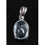 A white metal oval aquamarine pendant, the aquamarine measuring approx 10.0 x 6.7 x 4.8mm, weight