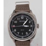 A gent's Bulova military brushed steel ultra-high frequency quartz wristwatch, having round black