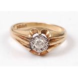 An 18ct yellow gold heavy set diamond single stone ring, comprising a round brilliant cut diamond in