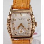 A Bulova gold plated gent's small size tank watch, having signed champagne dial with Arabic