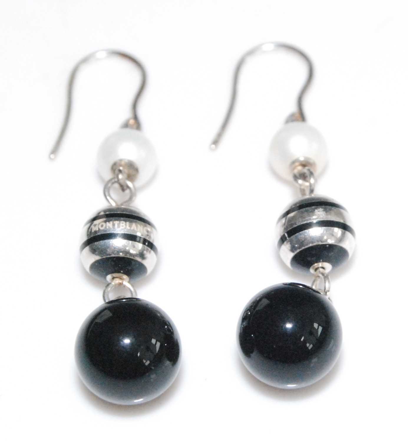 A pair of Mont Blanc silver, cultured pearl and black onyx bead three-tier ear pendants, on