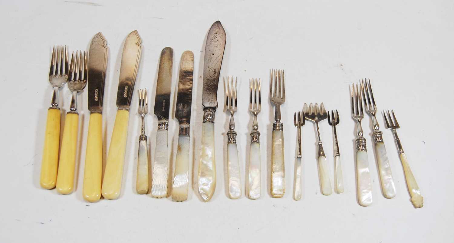 A collection of assorted 19th century and later loose flatware to include silver bladed fish knives,