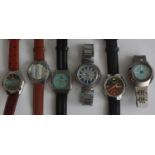 A collection of various gents circa 1970 and later fashion watches. some with manual wind and