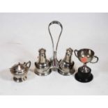 An early 20th century silver two-bottle cruet stand, with associated silver salt and pepper
