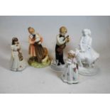 A collection of four Royal Doulton figurines to include Childhood Days, I'm Nearly Ready HN2976, Age