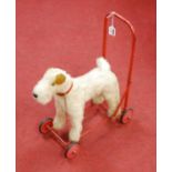 A Pedigree childs push-along straw filled dog