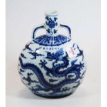 A Chinese export blue & white vase, the cylindrical neck flanked by twin loop handles, of