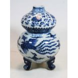 A Chinese export blue & white double gourd vase, decorated with Greek key, lotus flowers and a