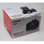 A Canon EOS650D digital camera, boxed, and with accessories