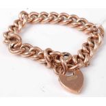 A 9ct gold hollow curblink bracelet, with heart shaped padlock clasp, 15.2g