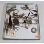 A collection of miscellaneous items, to include silver topped cut glass scent bottle, silver
